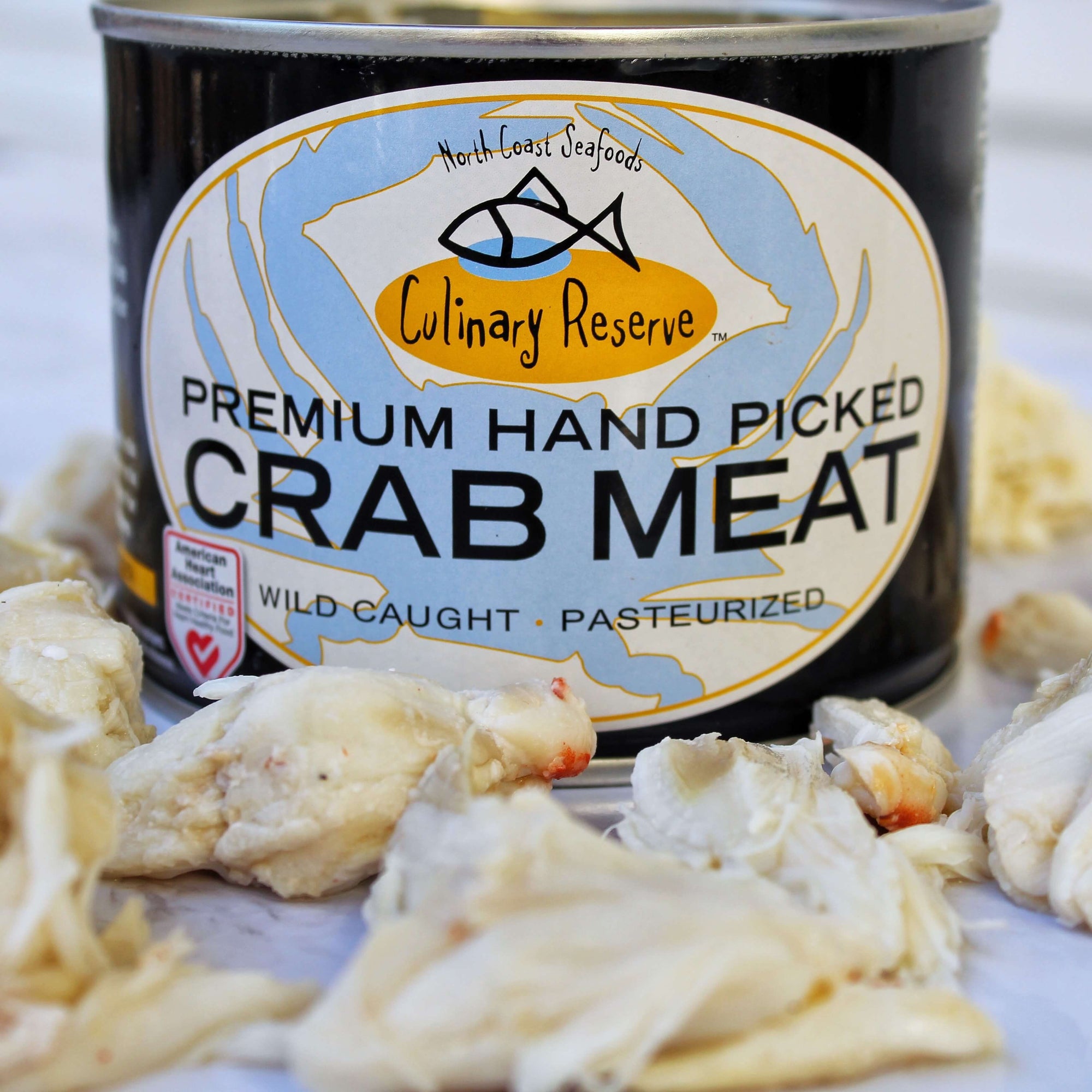 culinary reserve crab meat can with jumbo lump crab meat scattered in front of it
