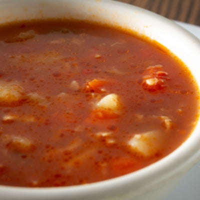 Closeup of a bowl of Manhattan Clam Chowder.
