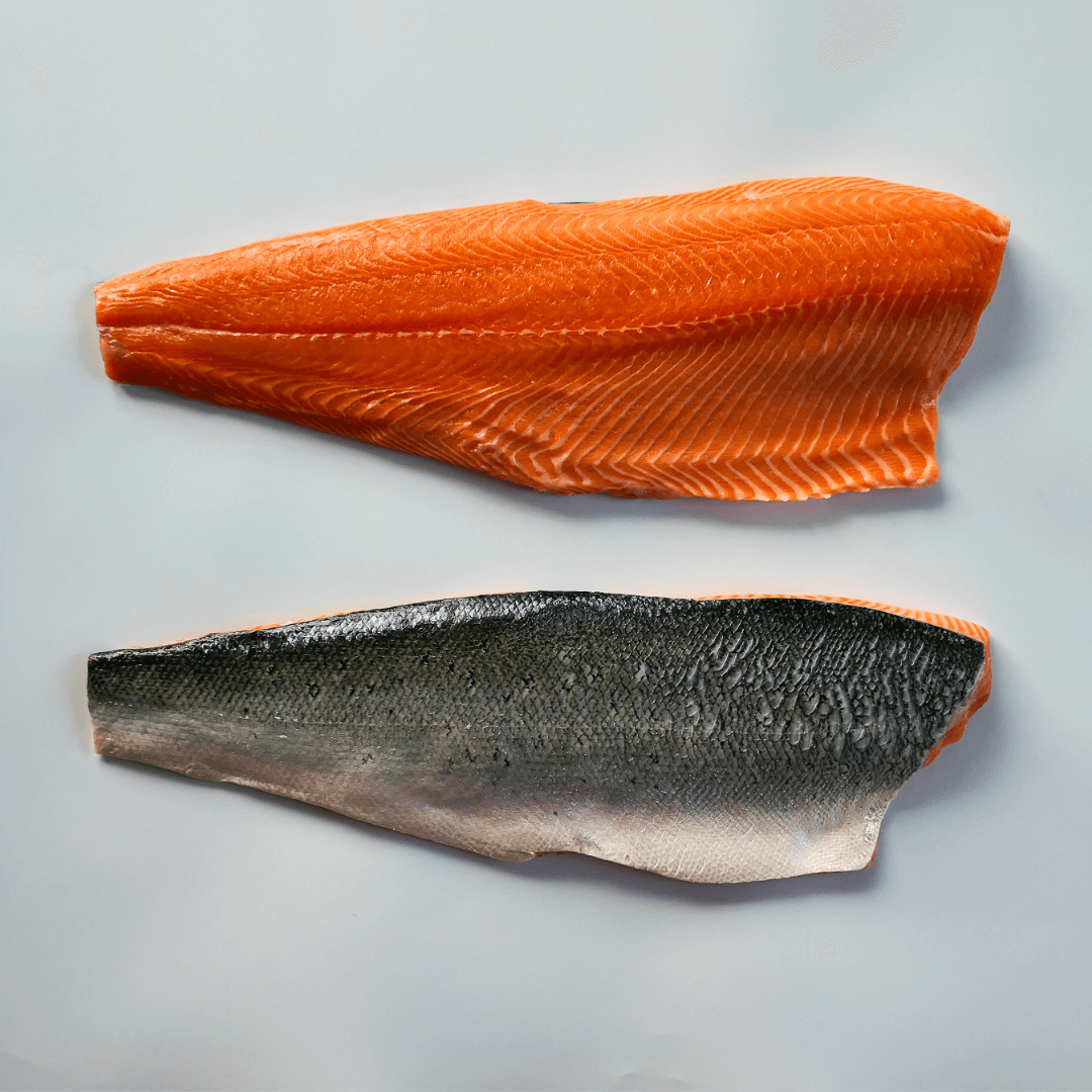 organic Scottish salmon fillets on a white background