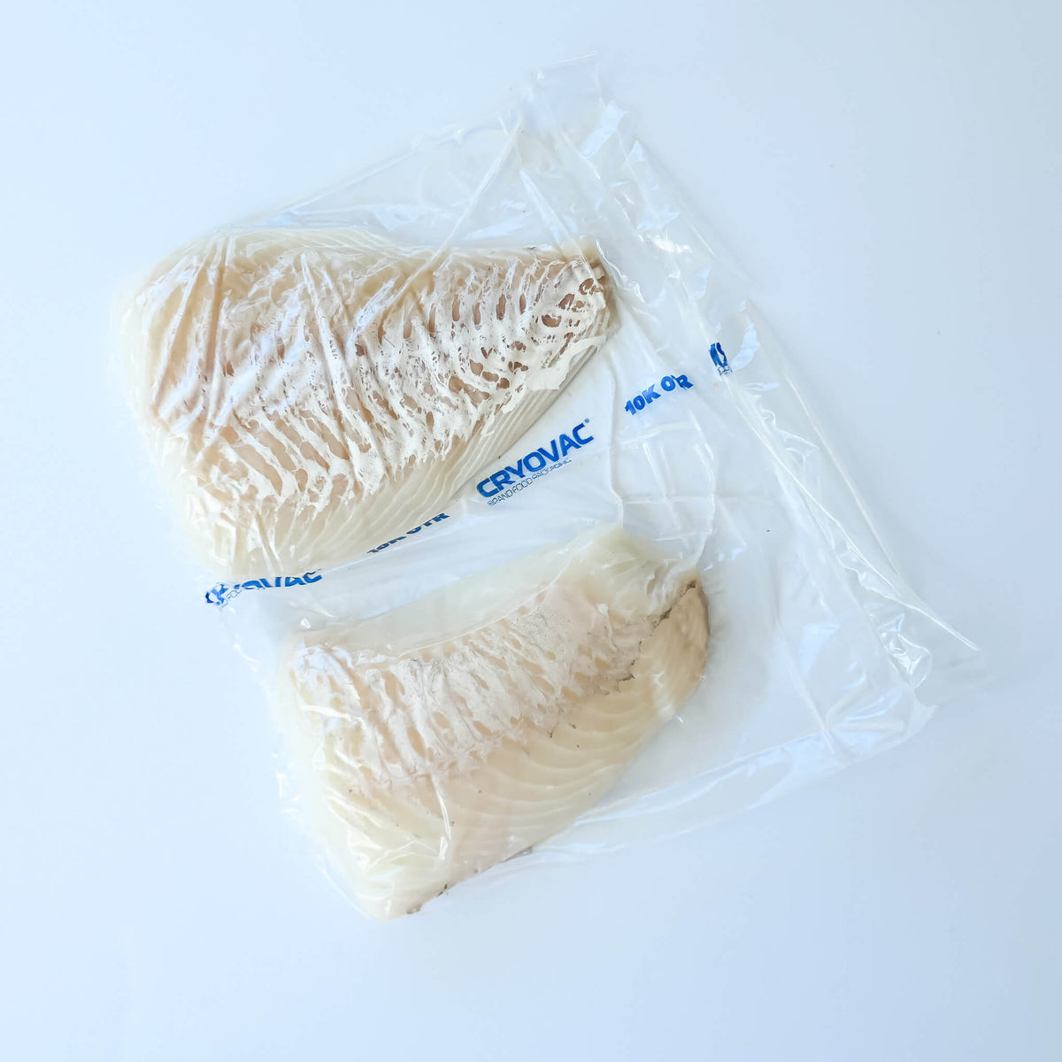 two 8 ounce fresh haddock portions in a clear bag