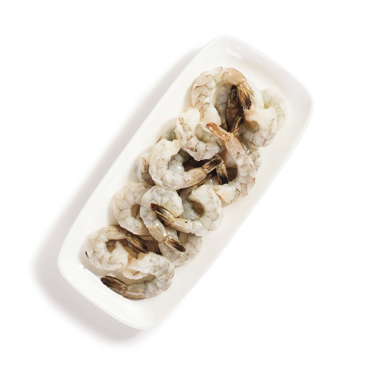 raw fresh shrimp on a white plate