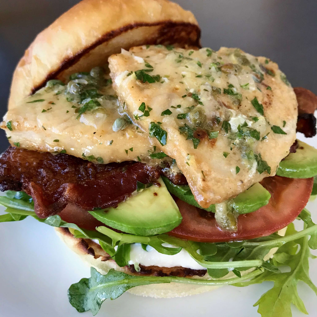 swordfish steak sandwich with bacon lettuce and tomato