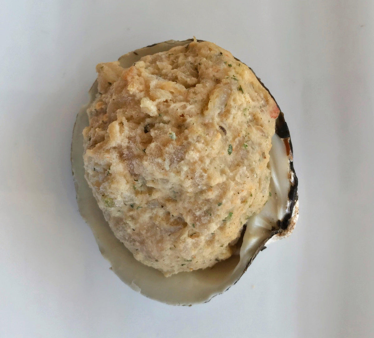 frozen stuffed clam on a white background